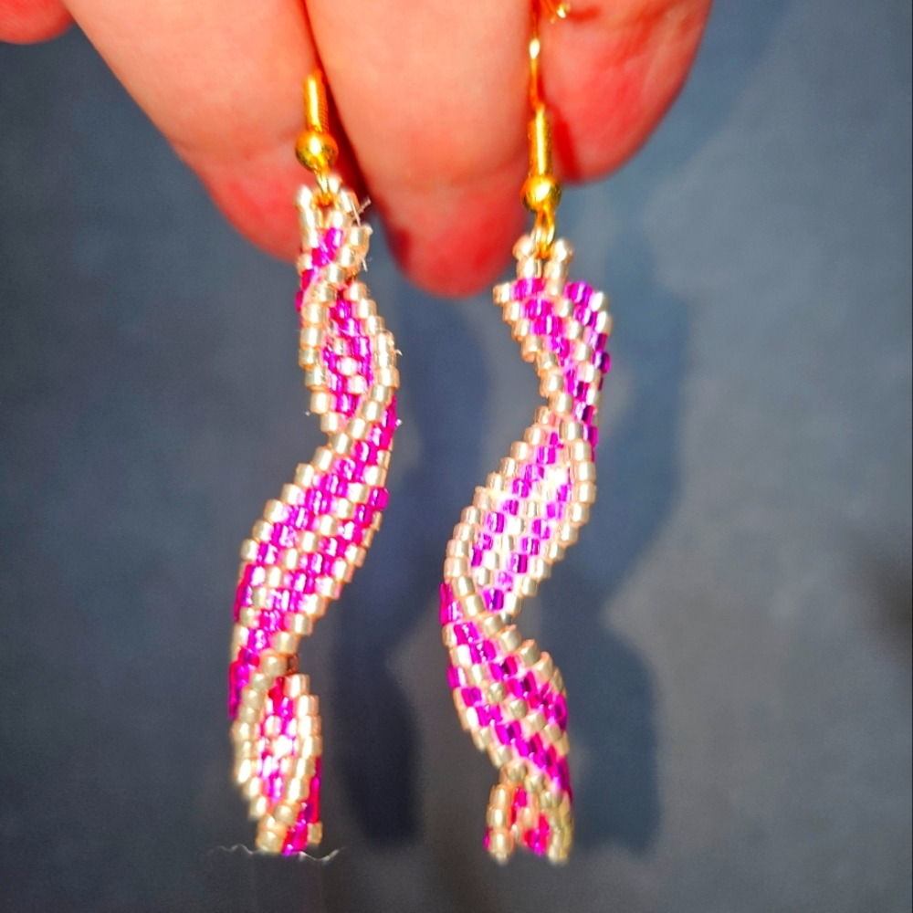 Stunning handmade beaded pink and gold spiral earrings